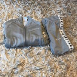 Grey zipper tracksuit good condition tiny mark on the knee blue dot nit notice able  can post £3.80