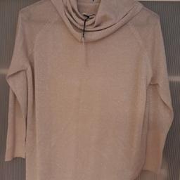 River Island New With tags gold top age 11/12 but it would fit size 10 ladies . collect L30 or can deliver local .