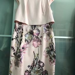 Beautiful Ted Baker dress with overtop all attached.
Cap sleeve floral skirt and plain top pink can be used on any occasion to dress up or go to the pub on Sunday for a garden beer!!

This dress is worn in great condition originally £169

Delivery Royal Mail second class signed for £4.10
Or Shpock delivery