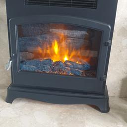 bemodern electric freestanding slim fire, fully working as new 2 heat settings and flame only, remote controlled ,paid £185