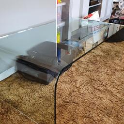 glass coffee table L110cm/W60cm/H40cm
Good condition just a little chip as shown in picture..
absolute bargain these tables cost  £250 new. 
