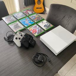 Xbox one s 1tb. 
8 games plus 2 controllers and charging station.
One of the controllers top trigger has came off but controller works perfectly fine.
Collection from Maghull, Liverpool
