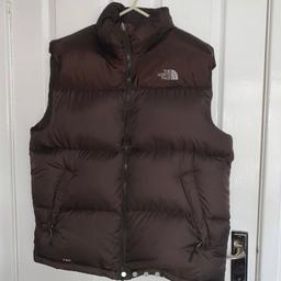The North Face puffer jacket vest. In good condition.