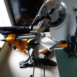 brand new jcb mitre saw never been used as you can see by the pictures