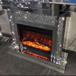 new in box luxury mirrored crushed diamond fireplace with built-in electric 🔥 remote control.
three different light and heat settings
ready to place where ever you want it .

measurements 120 x 35 x 106 high cms

£550 no offers (OR SCAMMERS )

free local delivery Portsmouth and surroundings

please add my Facebook page SPARKLES FURNITURE for more of this range.
