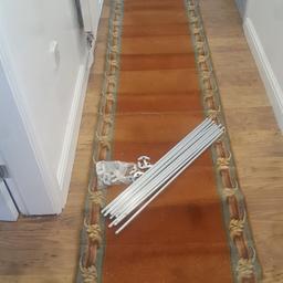 this beautiful design carpet was £600 alone without rods you wont see a carpet like this again looks beautiful on ur stairs will need a clean other wise great cindition not worn out