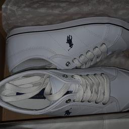 Brand new never worn in original box with tag trainers. Pure white size UK 5.5. Purchased for £50.00.