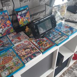 Nintendo wii excellent condition only sellig due to my daughter wanting a switch all working order comes with 2 remotes the wheel 9 games some never used also the amiibo games with the little characters and card for the game
