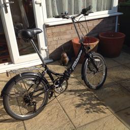 Falcon folding bike with 20" wheels 7 twist grip gears in good condition used but all works fine.