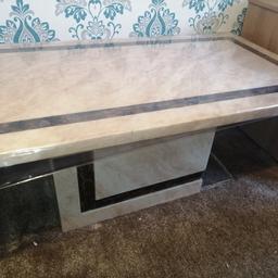 Beautiful marble table, cream with chocolate brown border and design on base. Selling due to space limitations, makes any living room classy! Open for viewings and reasonable offers. Thanks!