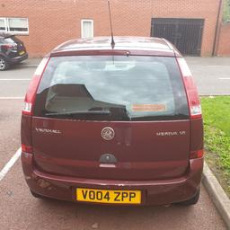 Burgundy Vauxhall Mariva 1.6 16v 5 door MOT till November 92788 on the clock, the top for some reason is striping but apart from that all is well