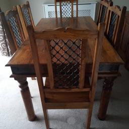 Here I have solid dark wood dinning table and 6 chairs with matching cabinet excellent condition like new ...Grab a bargain 😊😊