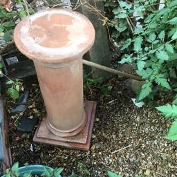 Height 28inches  x 13inches, base, 12inches top. Very sturdy and heavy outdoor plant pedestal. Has a slight chip, see photo 2, on top, approx. 2” x 1/2”.  Is old and well used but would suit diner to upgrade. COLLECTION ONLY.