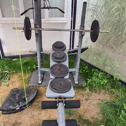Please find a multi function gym bench with lat pull down attachment and preacher attachment for bicep curls and also leg extensions.

Also slots to keep the attachments stored away. Can also be folded away to save space.

Also comes with the following weights;
2 x 20kg plates
2 x 10kg plates
2 x 6kg plates
2 x 2kg plates

Total - 76kg

Can be delivered locally.
