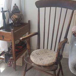 this chair is solid we have had it for a long time but we're not using it anymore and no where to store it I think it's windsor style I wouldn't take less than asking price and collection only please