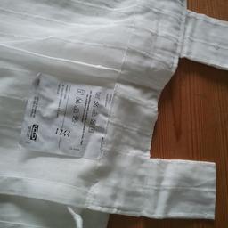 white 100% cotton curtains
approx 140cms x 250cms
good condition used once as a wedding drape
