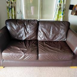 Sofa bed from DFS. It's brown faux leather that's a little worn in places. Bed part has been little used so can be considered as new.

only moving it on to fit a larger piece of furniture in.