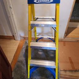 Has been used. 
But overall in good condition. 

Very sturdy and strong, can be used for anywhere in home or outdoor. 
Very light so easy to carry around. 

Fibreglass swingback ladder with non-conductive stiles. Ideal for use where electrical hazards exist. Features slip-resistant steps and edge bracing to prevent rail damage. A multi-functional holster top to keep tools organised and safe on the ladder. With a top tread height of 1.12m, allowing for indoor and outdoor work.