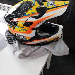 Shoei vfx-w mx helmet. Brand new and never been used. Still has the stickers on. Comes with the shoei bag. Size large