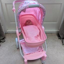 Lovely baby Annabell pink pram and baby. hardly used was for present but daughter has grown out of babies.

Swivel front wheels for turning
shopping base to carry items
reclining cover
adjustable handlebars for size
includes matching carry bag.

Doll NOT included.
Still with original box so can post it!

##check out my other items##