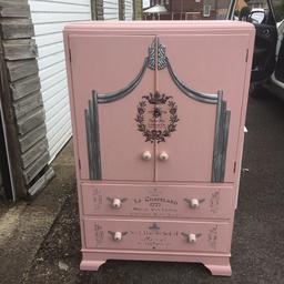 Shabby chic pink tall boy with draws and cuboard at the top got stencils on it a one off piece of furniture excellent condition grab a bargain