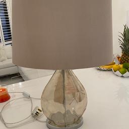 A beautiful lamp
It’s a beige/salmon colour
In good condition
Plus two picture frames
