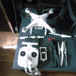 Comes with hard case / Rucksack , Drone, Remote, 2 Battery’s, Charger, Remote Phone Holder, 8 Propellers in very good condition.

•	View a live image streamed from the drone up to a half mile away on the DJI Go app using your mobile phone or tablet
•	GPS assisted flight features let you concentrate on getting great images while the drone helps you fly safely. You can achieve advanced camera perspectives with the Point of Interest, Follow Me and Waypoints modes 
•	Fly up to 25 minutes with the in