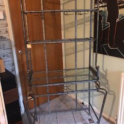this is H183cm x W99cm x D49cm

 glasses can be hanged from under the main top is glass all the other shelves are made up of metal as is the frame with ornate gold here and there
can be used as a bar
selling as i’m moving soon

buyer will have to organise collection b/f 1/10
can be dismantled easily fit in a estate car