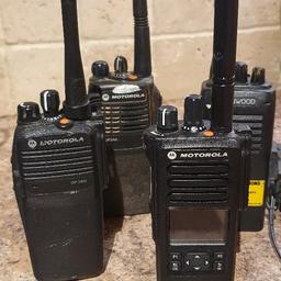 an assortment of radios . I'm pretty sure that they all work but I only have the charger for the front right Motorola.