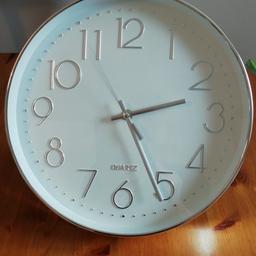 Silver trim clock suitable for any room excellent condition pick up only