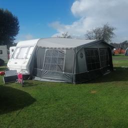 very good condition Isabella ambassador grey awning with tinted privacy windows and curtains all carbon fiber poles with it and caravan skirt