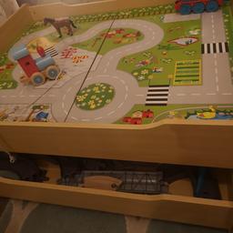 Great table for role play has 2 different themes that can be flipped around to suit whatever the kids want to role play has a hand storage draw underneath to put away toys /tracks etc. From a smoke and pet free home safe collection may deliver locally  (toys not included).