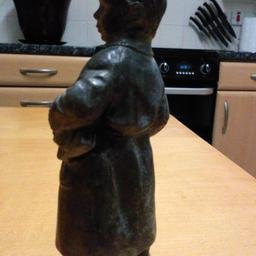 Very heavy statue of Little boy & his Teddy bronze in colour don't no what its made of good condition