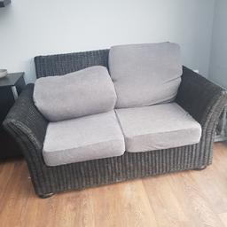 lovely shaped conservatory sofa suite. 2 seater and 2 single chairs. Was originally a brown colour but has been sprayed black, needs going over again though as was never fully finished and has come off in lots of places that's been bumped. Cushions are beige but have grey elastic covers over them all. Seat bases lift off so makes good storage underneath them all. Would be a good upcycle project. Collection from Oswaldtwistle