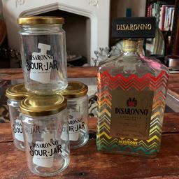 You are buying a very rare Disaronno dressed by Missoni  empty bottle and 4 Disaronno sours jars . The Missoni bottle is very hard to get hard of now