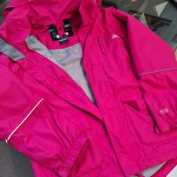 fleece lined waterproof coat.
pink coat has pockets, zip and hood.
removable inside fleece, with pockets and zip. each coat can be worn independently.
only worn a handful of times. Immaculate condition