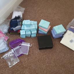 all new never used over 10 ring boxes and 8 other jewellery boxes all have padding in them 1 black box and approx 30 little carry boxes and over 100 net bags in various colours and sized
