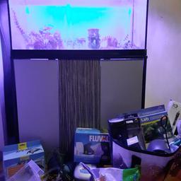 fishtank with all accessories to fully set up ,under gravel filter ,flavel pump,thermostat, ornaments, lights,treatments,ph test kits ,gravel ,lots more £150ono