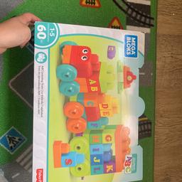 Fisher-Price Mega Bloks train, all parts included and in original box.