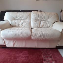 2 seater leather sofa. 
in very good condition. no rips or holes.
cream.
collection from Addlestone