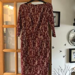 Nice peplum dress winter dressy outfit ...

Never been worn
3/4 length sleeve has stretch /give
Burgundy lace and beige under lining
Really flattering as slimming features from Gok.

Delivery Royal Mail 2nd class signed
Or can collect