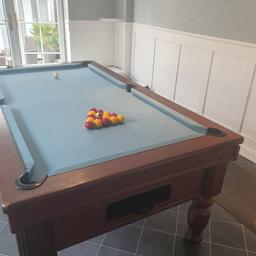 pub style slate bed pool table, altered to free play. comes with x2 sets of balls and a couple of cues. will need atleast 2 people to collect.