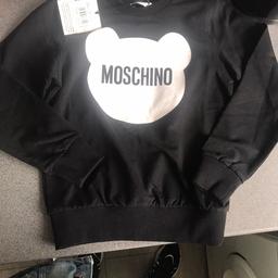 New with tags also have proof of purchase , quite small fittings you will no if you buy moschino what sizing is like