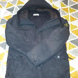 Stone Island Downs jacket in black. (Large)
condition is used but has been looked after. slight discolour on the inside of the hood. Authenticity can be checked by scanning the tab inside.

purchased for £650. proof of purchase is available.