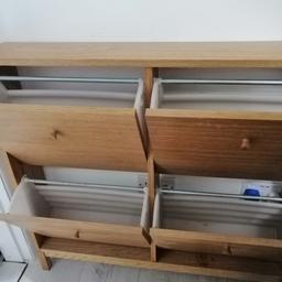 In very good condition and smart looking shoe cabinet. Solid peace of furniture. Its oak in colour.