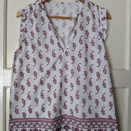 Brand new red and white patterned top. Medium size. Bought in a lost stock box but it's not my style.

I also have the same top in blue and white, see my other listings.