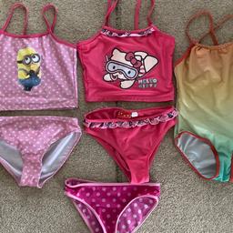 Minions tankini, Hello Kitty tankini and Regatta swimsuit. Fit girl age 6-7 and 7-8