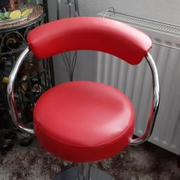 Red/Chrome Barstool with adjustable lever height .used but very small scratch  on the backrest as shown in picture 4.