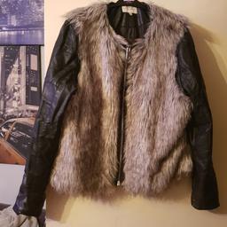 black leather and fur coat  good one size 18 collection only from brierley hill no delivery no posting
