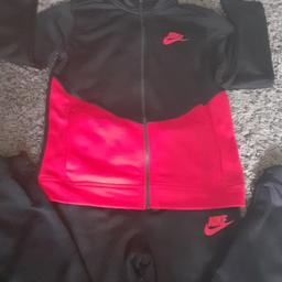 brand new without tags unwanted preasants boys nike tracksuits one red and black and one gray age 11 to 12. still 40 quid each in sports direct. cuffed bottoms and zip up jacket. collection only. will sell both together for 30 or one 20 quid each.